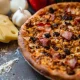 meniu-pizza-chilli-con-carne-timisoara-pizza-mamamia-livrare-02 Pizza Chilli con Carne cu carne tocată, costiță afumată, porumb și chilli + Pizzeria Mama Mia – Rețete italiene autentice. Livrare GRATUITĂ în Timișoara și comunele din jur.